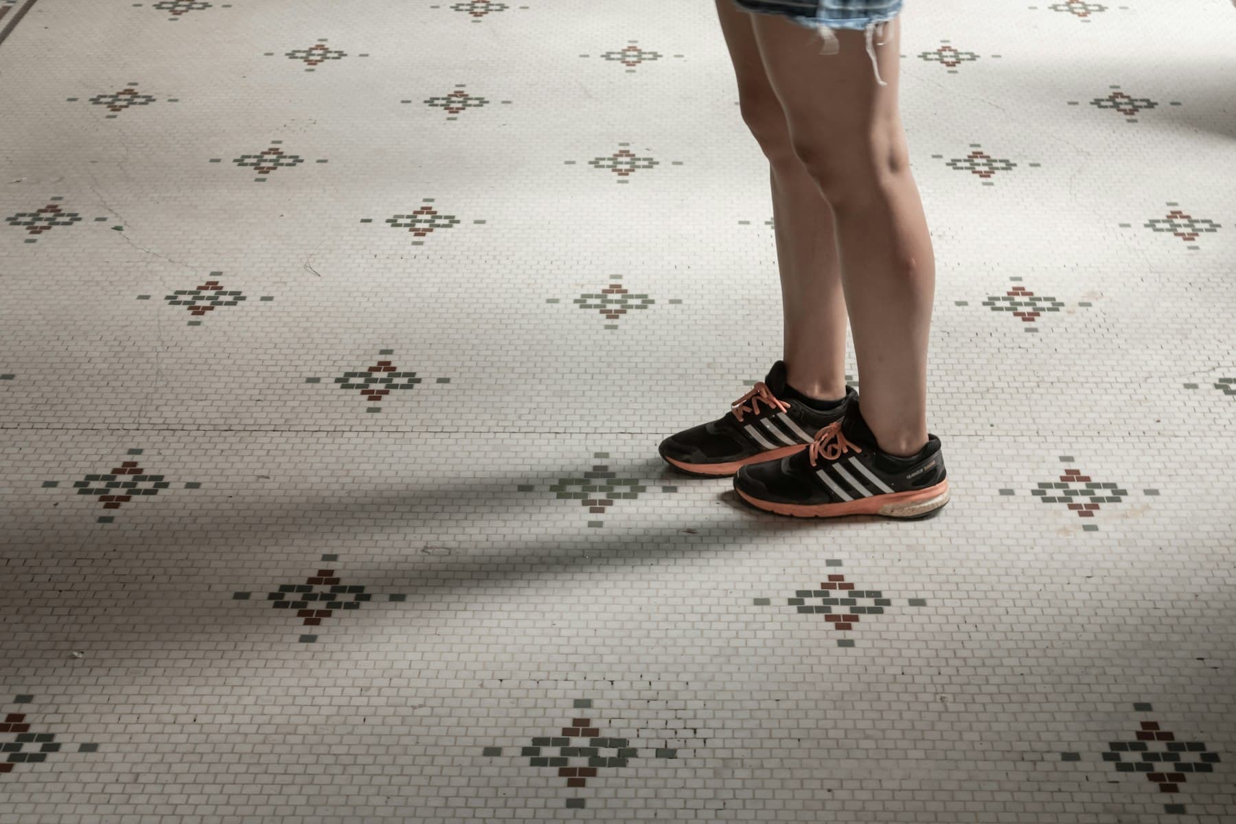 A tiled floor cleaned and dried.